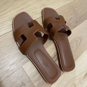 Hermes Oran sandals.